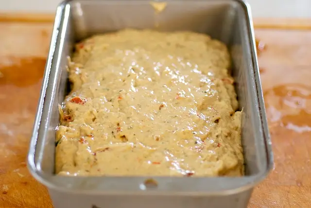 Pour into the prepared loaf pan. 