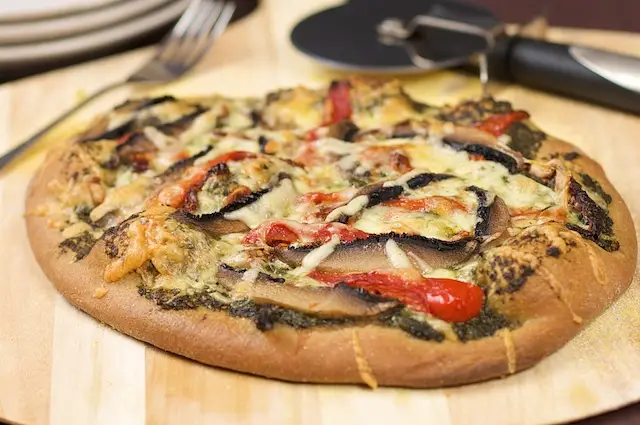 Basil Pesto, Roasted Pepper, Sun-dried Tomatoes & Portabella Mushrooms Pizza