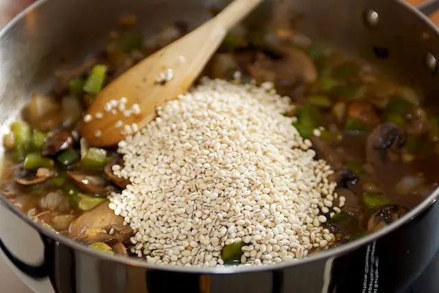 Then I added the toasted barley into the pan.