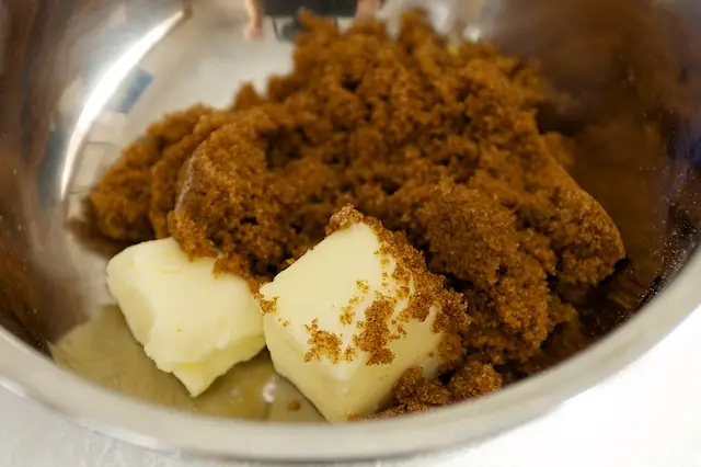 In another bowl, add the butter and sugar.
