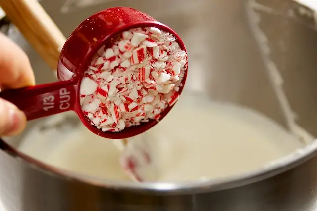 Stir in crushed candy cane pieces.