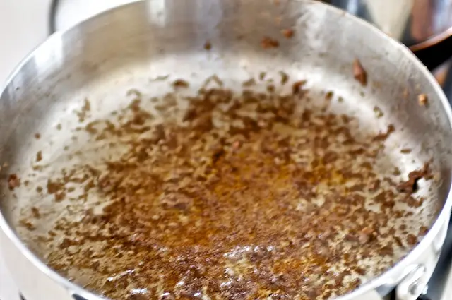 Ideally you will develop a rich brown fond (brown bits) on the bottom of the pan.