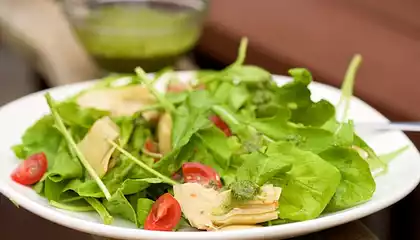 Arugula, Artichoke and Cherry Tomato  Salad with Pesto Vinaigrette