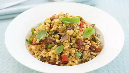 Israeli Couscous with Sauteed Mushrooms, Pine Nuts and Sun-Dried Tomatoes 