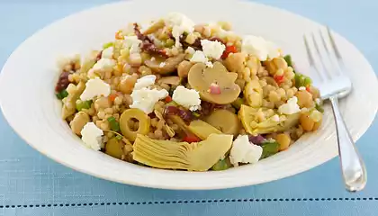 Chickpea, Marinated Artichoke Hearts, Mushrooms, and Sun-Dried Tomato Couscous Salad with Feta