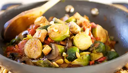 Tomato Braised Brussel Sprouts with Pine Nuts and Croutons