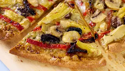 Basil Pesto, Artichoke Hearts, Sun-dried Tomato and Roasted Bell Pepper Pizza