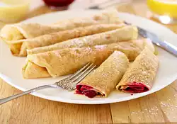 Raspberry Crepes with Creamy Orange Syrup