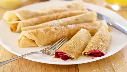 Raspberry Crepes with Creamy Orange Syrup