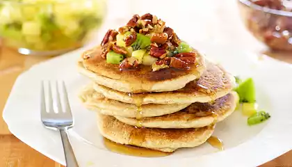 Whole Wheat Pancakes with Maple Candied Pecans and Tropical Fruit
