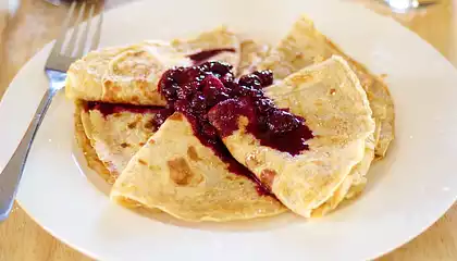 Breakfast Crepes with Warm Berry Sauce