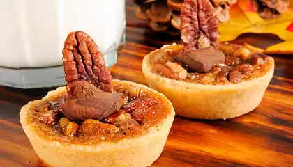 Pecan Tarts with Caramel Sauce