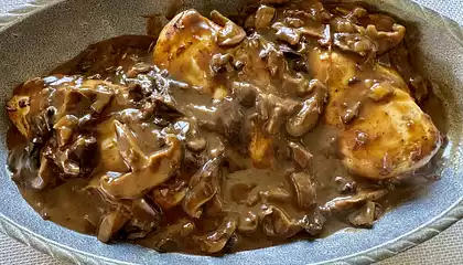 Grilled Chicken Breasts with Wild Mushroom & Bourbon Sauce