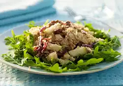 Quinoa and Arugula Salad with Pears, Walnuts, Dried Fruits, and Jack Cheese