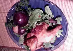 Cornish Hens and Plums on Baby Spinach