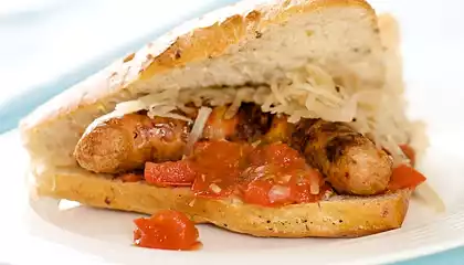 Grilled Sausage Sandwiches with Tomato Jam and Sauerkraut