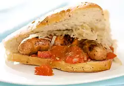 Grilled Sausage Sandwiches with Tomato Jam and Sauerkraut