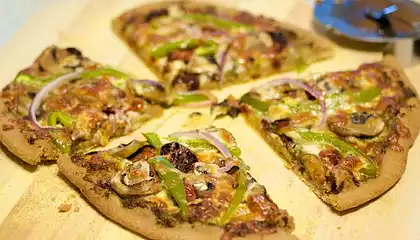 Oven-Dried Heirloom Tomato, Basil Pesto and Mozzarella Pizza