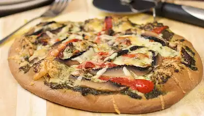 Basil Pesto, Roasted Pepper, Sun-dried Tomatoes and Portabella Mushrooms Pizza