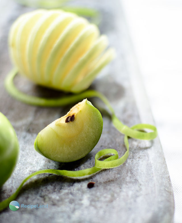 Granny Smith apple wedge and spiral sliced