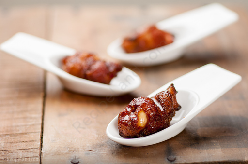 Sweet spicy bacon wrapped chicken bites