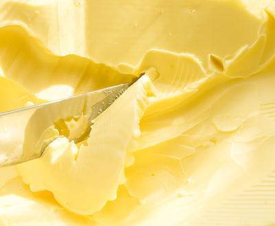 margarine spread close-up with knife